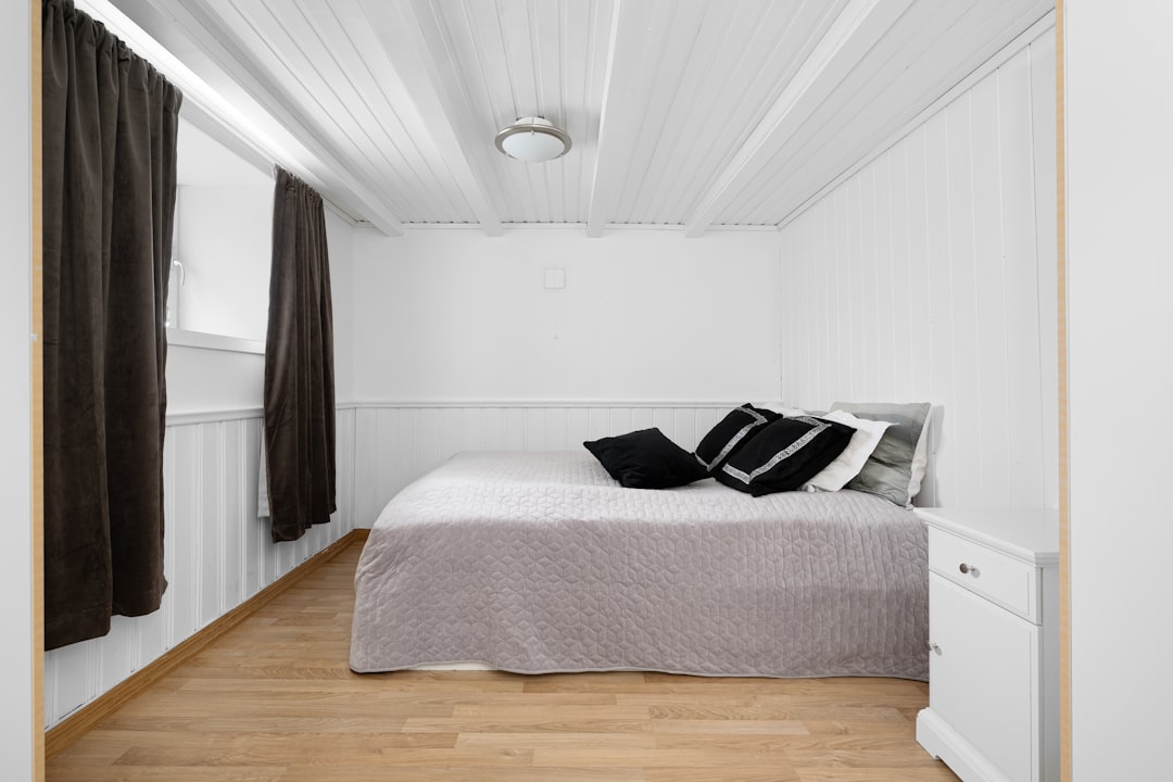 Convertible Murphy affordable bookcase storage beds in a studio apartment