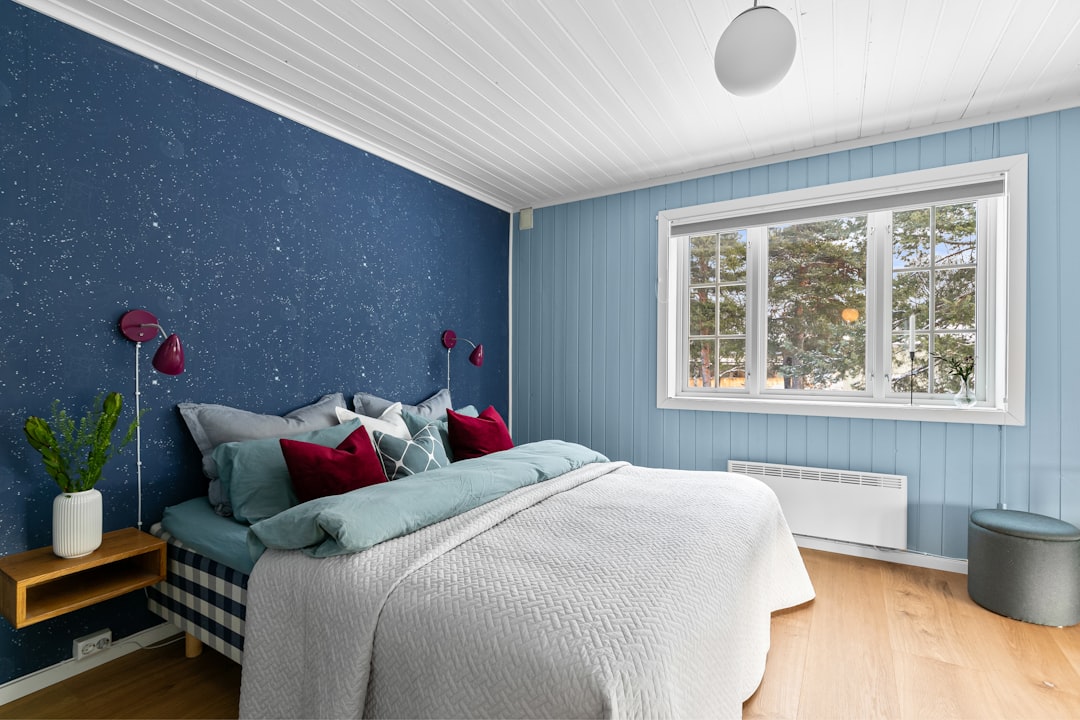 Affordable bookcase storage beds for kids' small bedrooms with colorful shelves