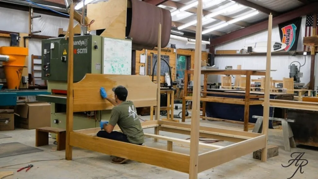 DIY four-poster canopy bed frame build in a small workshop