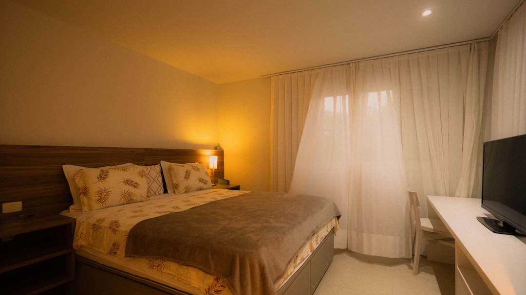 side-by-side beds showing duvet and comforter for seasonal use