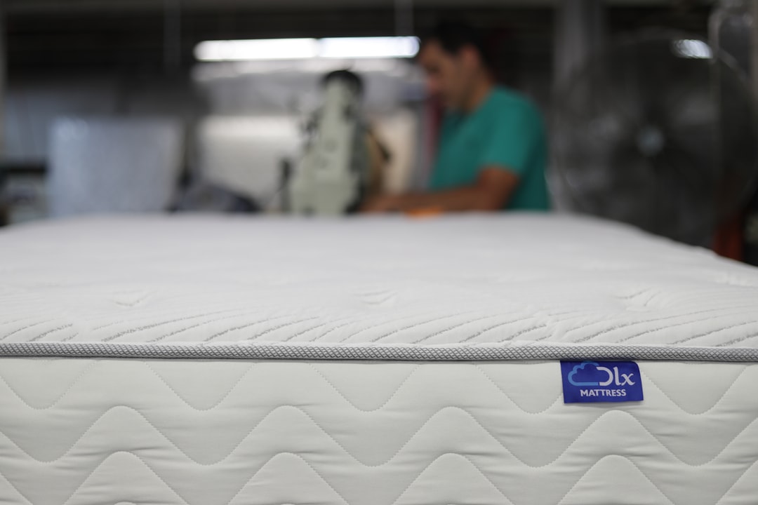 Hybrid mattress cutaway showing pocket coils and foam comfort layers f featuring hybrid memory foam