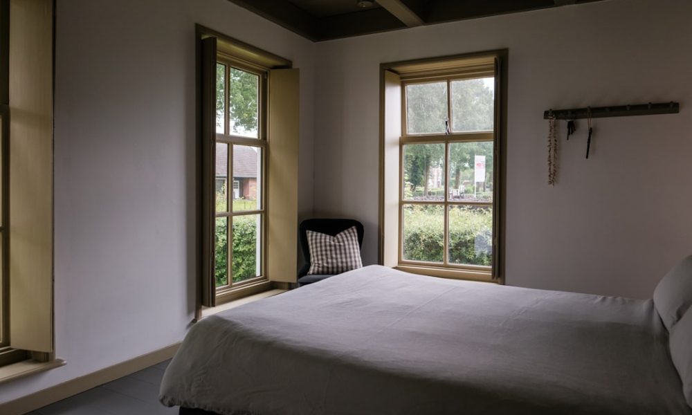 The Beauty Of Wood Bed Frames In Traditional Settings - Featured Image